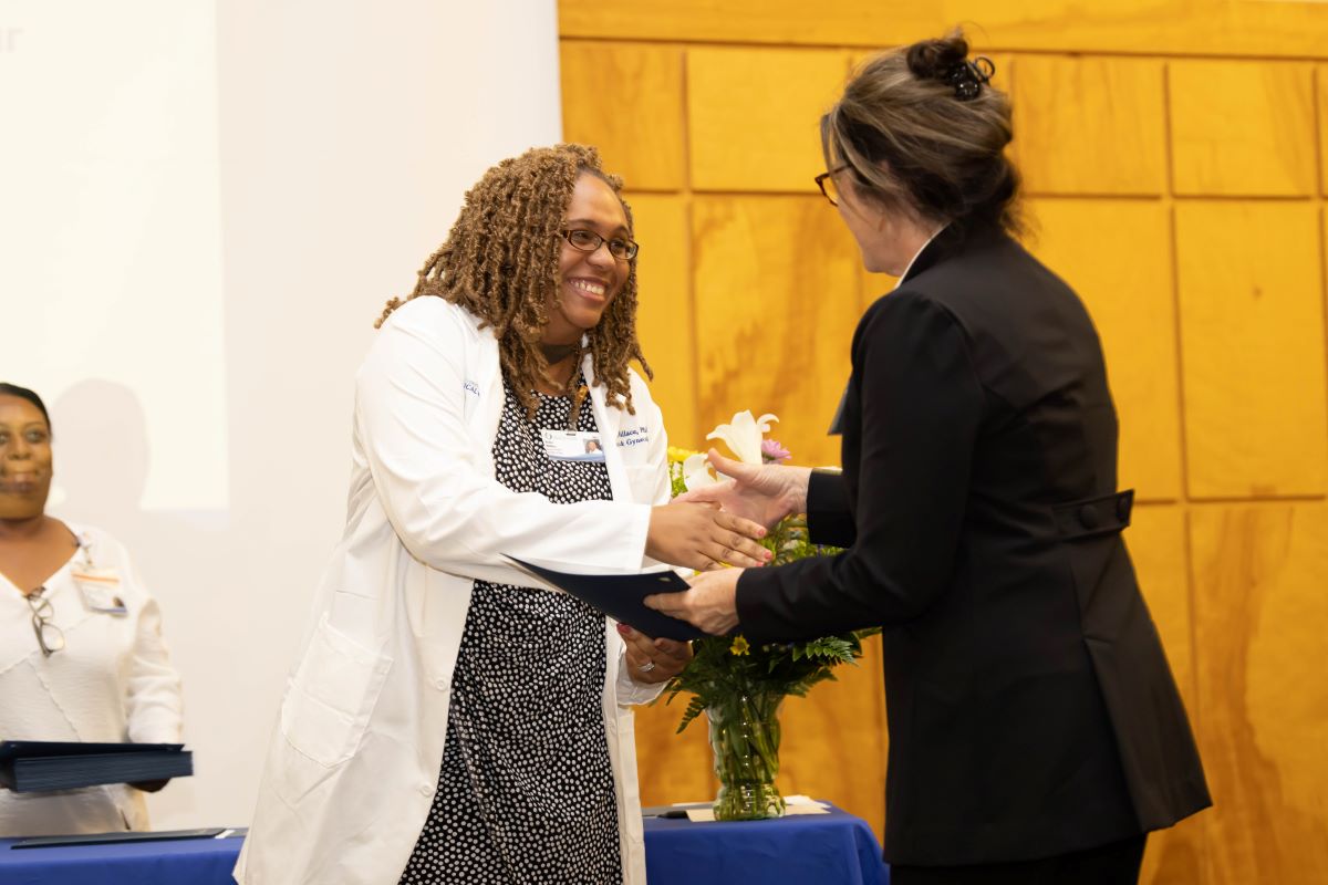 Student accepting an award at the 2023 Honors and Awards Ceremony